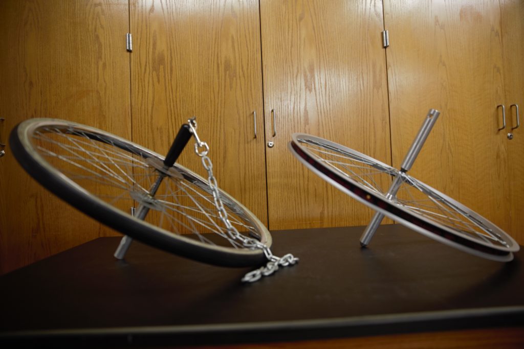 (1Q50.21) Bike Wheel Gyroscope on Rope TAMU Physics Lab Center
